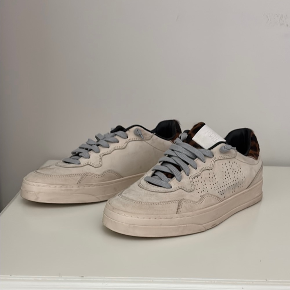 P448 Cream grey sneakers with cheetah pony hair accents.